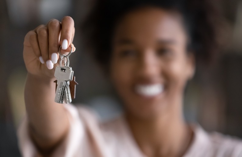 Tenant holding a new set of house keys